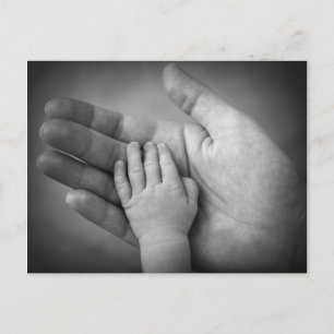 Postcard baby's hand in mothers hand.