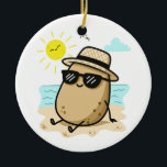 Potato On The Beach Summer Vibes Ceramic Ornament<br><div class="desc">There's nothing like a sunny day at the beach. ask this funny, cute potato chilling by the sea. He is wearing dark shades, a cool hat and a happy smile. He is relaxing on the warm sand and watching the blue ocean. A happy yellow sun is beaming down on him...</div>