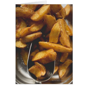 Potato wedges with salt (detail)