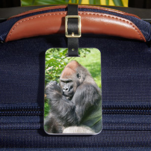 Powerful Silverback Gorilla Amidst Green Foliage Luggage Tag