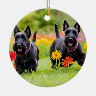 Prancing Scottish Terriers in grass and flowers Ceramic Ornament