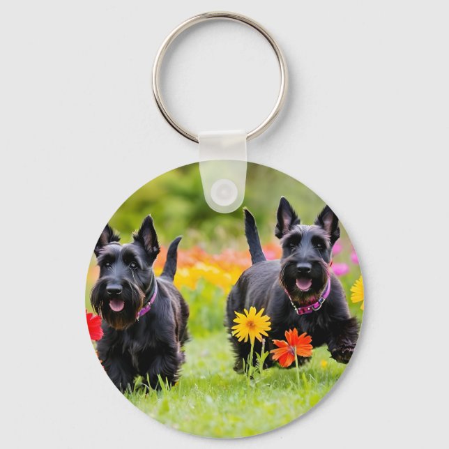 Prancing Scottish Terriers in grass and flowers Key Ring (Front)