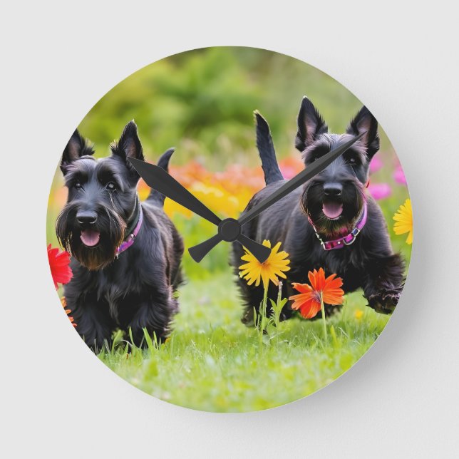 Prancing Scottish Terriers in grass and flowers Round Clock (Front)