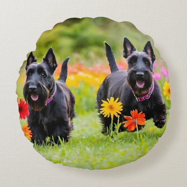 Prancing Scottish Terriers in grass and flowers Round Cushion (Front)