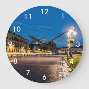 Prato della Valle at night in Padova, Italy Large Clock