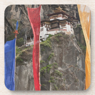 Prayer flags hang near Taktshang Coaster