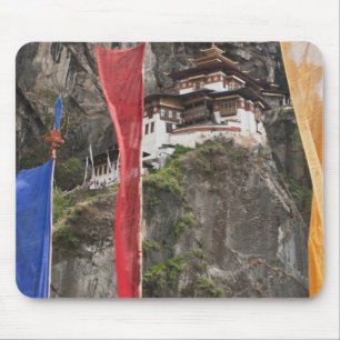 Prayer flags hang near Taktshang Mouse Pad