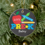 Pre-K Preschool Keepsake Apple Crayons Chalkboard Ceramic Ornament<br><div class="desc">Pre-K ornament design features an apple, a pencil, colourful crayons and bold, fun typography! Click the customise button for more options for modifying the text! Variations of this design, additional colours, as well as coordinating products are available in our shop, zazzle.com/store/doodlelulu. Contact us if you need this design applied to...</div>