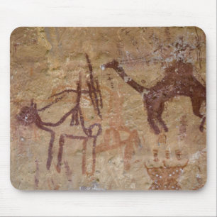 Prehistoric rock paintings with camels and mouse pad