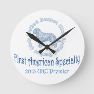 PremierLogoZ.png Round Clock