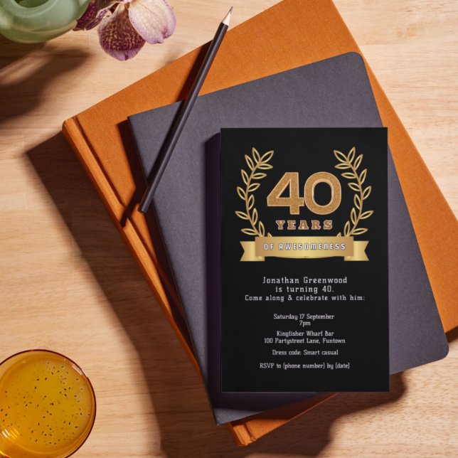 Premium '40 years of awesomeness' black & gold (Stylish 40th birthday invitation, shown insiu on a desk with brown leather diary.)