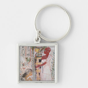 Preparing a mummy for a purification ceremony key ring