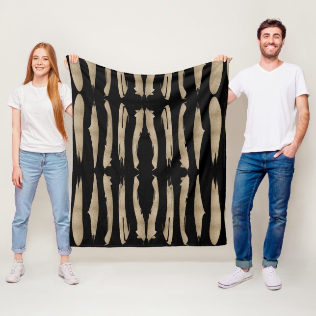preppy geometric pattern black and gold stripes fleece blanket (In Situ)