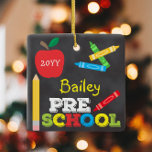 Preschool Keepsake Chalkboard Colourful Kids Ceramic Ornament<br><div class="desc">Pre-K ornament design features an apple, a ruler, crayons and bold, colourful fun typography! Click the customise button for more options for modifying the text! Variations of this design, additional colours, as well as coordinating products are available in our shop, zazzle.com/store/doodlelulu. Contact us if you need this design applied to...</div>