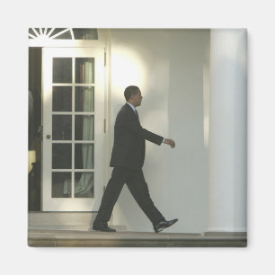 President Barack in deep thought as he walks Magnet