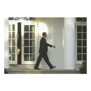 President Barack in deep thought as he walks Photo Print