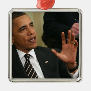 President Barack Obama talks to the press Metal Ornament