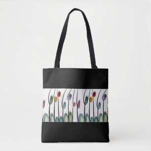 Pretty abstract floral border on black tote bag