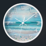 Pretty Blue Ocean Waves and Sea Glass  Clock<br><div class="desc">Beautiful blue ocean waves on a sandy beach with blue and teal sea glass and blue cloudy skies.</div>