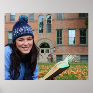 Pretty college student studying in autumn leaves poster