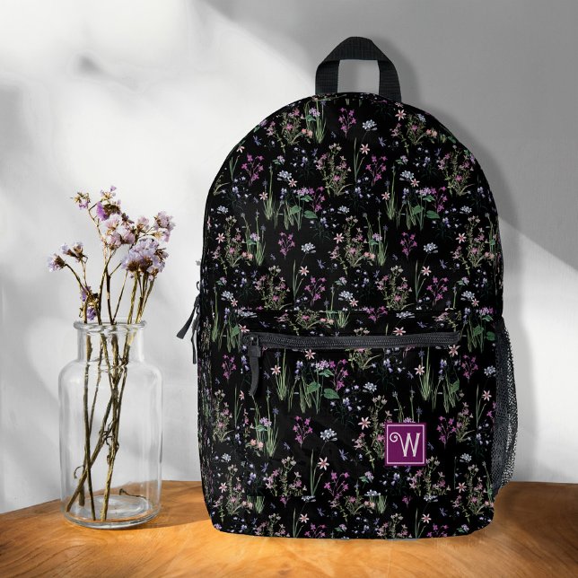 Pretty Ditsy FLoral Pattern Black Violet Monogram Printed Backpack (Pretty ditsy floral pattern black and purple, romantic, cute, cottage garden, monogram backpack.)
