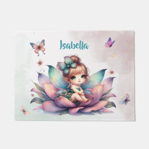 Pretty fairy sitting inside flower doormat