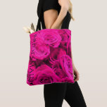 Pretty girly pink roses tote bag<br><div class="desc">Experience the captivating allure of deep beautiful pink roses with our custom print-on-demand products! Immerse yourself in a world of ethereal blossoms that captivate the senses and awaken the imagination. Our custom designs show case the allure of these rare and mystical flowers, presenting them in a variety of forms to...</div>
