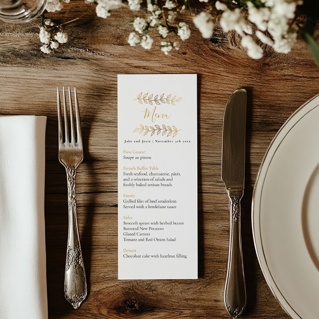 Pretty gold effect leaves wedding table menu (Wedding reception dinner menu with black and gold text and delicate gold leaves framing the top.)