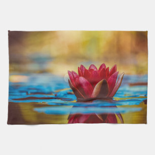 Pretty Photo of a Lotus Flower in a Pond Tea Towel
