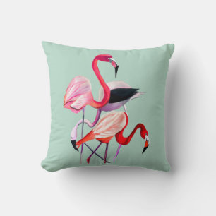 Pretty pink flamingo on blue cushion