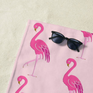 Pretty pink flamingos on a pink background beach towel
