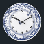 pretty vintage blue delft plate clock<br><div class="desc">pretty vintage blue delft plate clock. This blue and white plate clock is based on the popular and collectable antique delft plates seen in country kitchens the world over. This clock would look great in a traditional kitchen or living room or over a pine dresser. Makes a great gift for...</div>