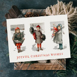 Pretty Vintage Children with Christmas Greenery Holiday Card<br><div class="desc">This simple,  stylish Christmas holiday greeting card features vintage artwork of three children carrying Christmas greenery decorations. Easy to personalise for memorable greetings for family and friends.</div>