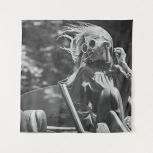 Pretty woman in convertible car tapestry