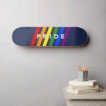 PRIDE Diagonal LGBT Rainbow Stripes on Navy Blue Skateboard<br><div class="desc">Celebrate LGBTQ Pride with diagonal rainbow stripes with the word PRIDE in bold white typography between and partially overlapping the coloured stripes on a navy blue background. Red, orange, yellow, green, blue, and violet angled lines go from left to right. To see the modern gay pride design on other items,...</div>