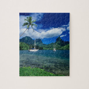 Private yachts anchored in Opunohu Bay on the Jigsaw Puzzle