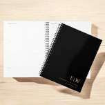 Professional Black and Gold Monogram Initial Planner<br><div class="desc">Stay organised in style with this Professional Black and Gold Monogram Initial Planner. Featuring a sleek black cover with a bold faux gold monogram, this planner combines elegance with everyday functionality. Whether you're scheduling meetings, tracking goals, or managing tasks, this customisable planner is perfect for professionals, students, or entrepreneurs who...</div>