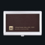 Professional Luxury Initial Logo Business Card Holder<br><div class="desc">Simple modern luxury design with brushed metallic gold initial logo medallion with personalised name,  title,  company name or custom text below on a rich oxblood leather look background. Personalise for your custom use.</div>