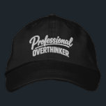 Professional Overthinker Funny Humor Embroidered Hat<br><div class="desc">Professional Overthinker Funny embroidered cap from Ricaso - Show off your sense of humor with the “Professional Overthinker” text-based design — perfect for anyone whose mind never quite switches off. Simple, bold typography delivers the joke instantly, making it relatable for thinkers, planners, worriers, and anyone who tends to analyze things...</div>