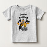 Promoted to BIG Brother and Digging it. Editable Baby T-Shirt<br><div class="desc">Promoted to Big Brother and Digging it. Picture of a digger. Editable name. Custom printed t-shirt personalised with "Promoted to Big Brother" graphic in modern fonts with a yellow and black digger design. Perfect for a pregnancy announcement photo or a gift for older siblings when new baby arrives! Use the...</div>