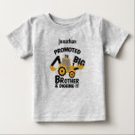 Promoted to BIG Brother and Digging it. Editable Baby T-Shirt<br><div class="desc">Promoted to Big Brother and Digging it. Picture of a digger. Editable name. Custom printed t-shirt personalised with "Promoted to Big Brother" graphic in modern fonts with a yellow and black digger design. Perfect for a pregnancy announcement photo or a gift for older siblings when new baby arrives! Use the...</div>