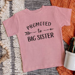 Promoted to Big Sister New Baby Announcement<br><div class="desc">Custom printed apparel personalised with "Promoted to Big Sister" graphic in trendy modern fonts with a boho arrow design. Perfect for a pregnancy announcement photo or a gift for older siblings when new baby arrives! Use the design tools to edit the colours or add your own text and photos to...</div>