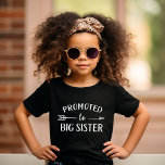 Promoted to Big Sister Pregnancy Announcement Baby T-Shirt<br><div class="desc">Custom printed apparel personalised with "Promoted to Big Sister" graphic in trendy modern fonts with a boho arrow design. Perfect for a pregnancy announcement photo or a gift for older siblings when new baby arrives! Use the design tools to edit the colours or add your own text and photos to...</div>