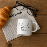 Promoted to Uncle EST 2025 | Minimalist Gift  Espresso Cup<br><div class="desc">Celebrate a special moment with this elegant “Promoted to Uncle” espresso cup – a perfect keepsake for first-time uncles! Featuring a clean,  minimalist design with “Uncle” in a stylish script font and customisable EST year,  this small but mighty cup is great for sipping coffee in style.</div>