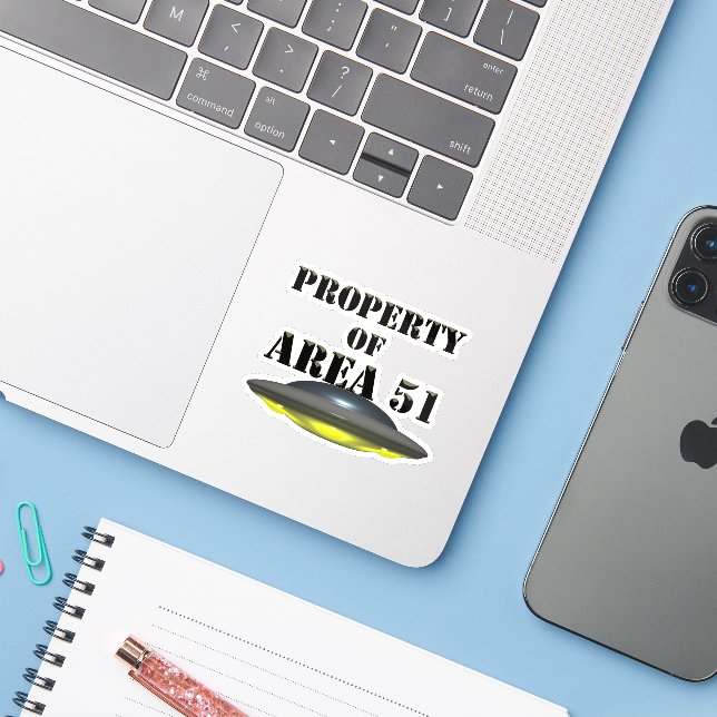 Property of Area 51 (Laptop w/ iPhone)