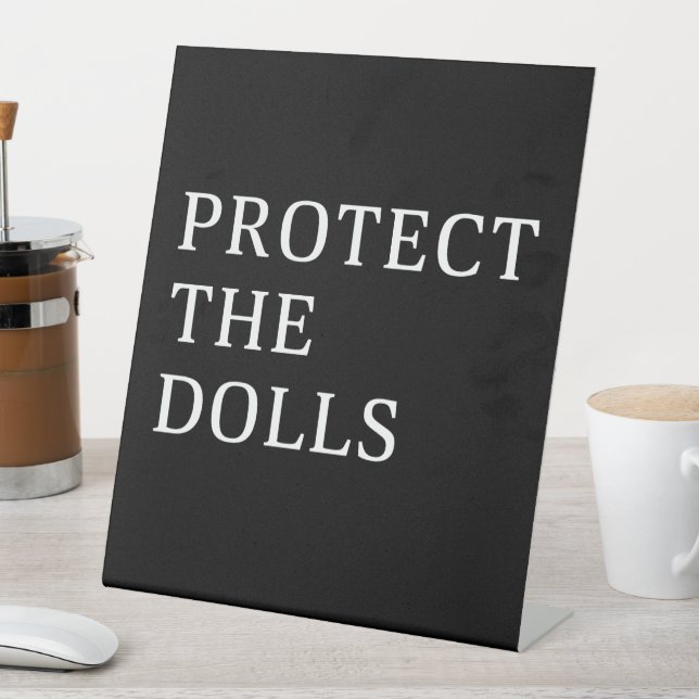 Protect The Dolls Pedestal Sign (In SItu)