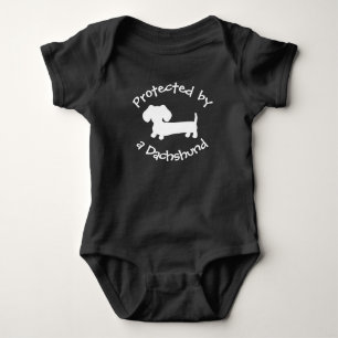Protected by a Dachshund - Baby Wiener Dog Lover B Bodysuit