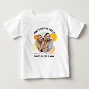Protected by Dog Loved by Dad and Mo Personalized Baby T-Shirt