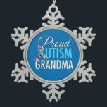 Proud Autism Grandma Snowflake Pewter Christmas Ornament<br><div class="desc">A beautiful autism awareness gift fora proud grandmother of an autistic grandson or granddaughter. The A in Autism is the puzzle piece awareness ribbon next to blue text for a proud Grandma.</div>