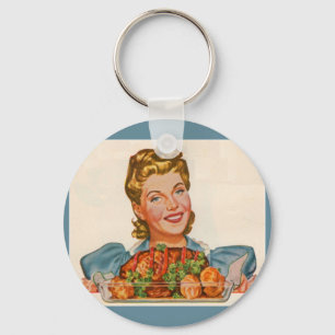 proud housewife with her dinner creation key ring